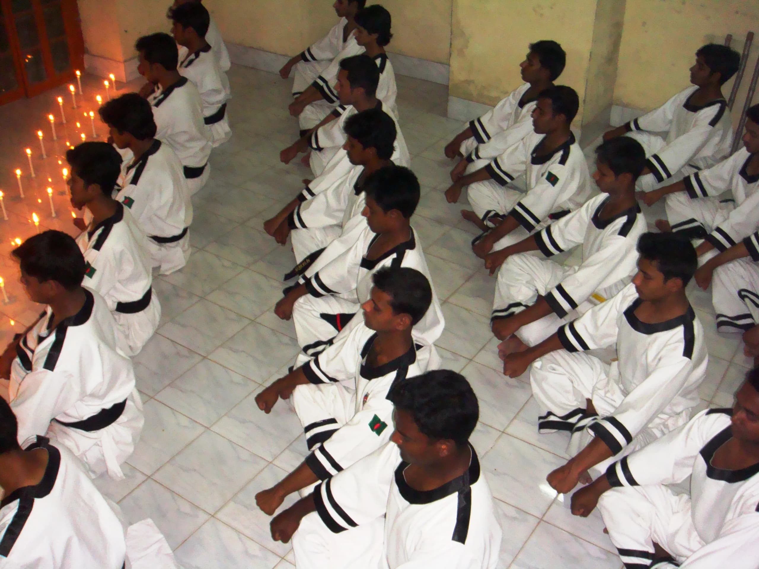 Butthan students in meditation before training