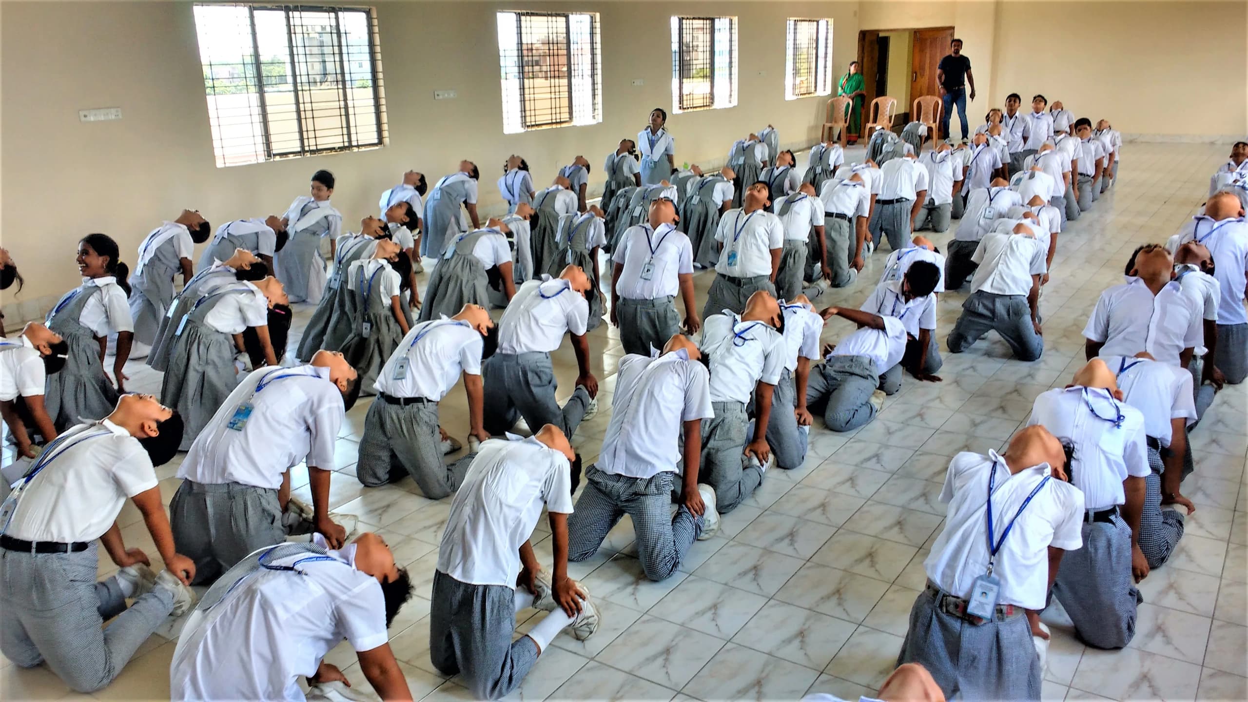 Students practising Vajrapran in a hall